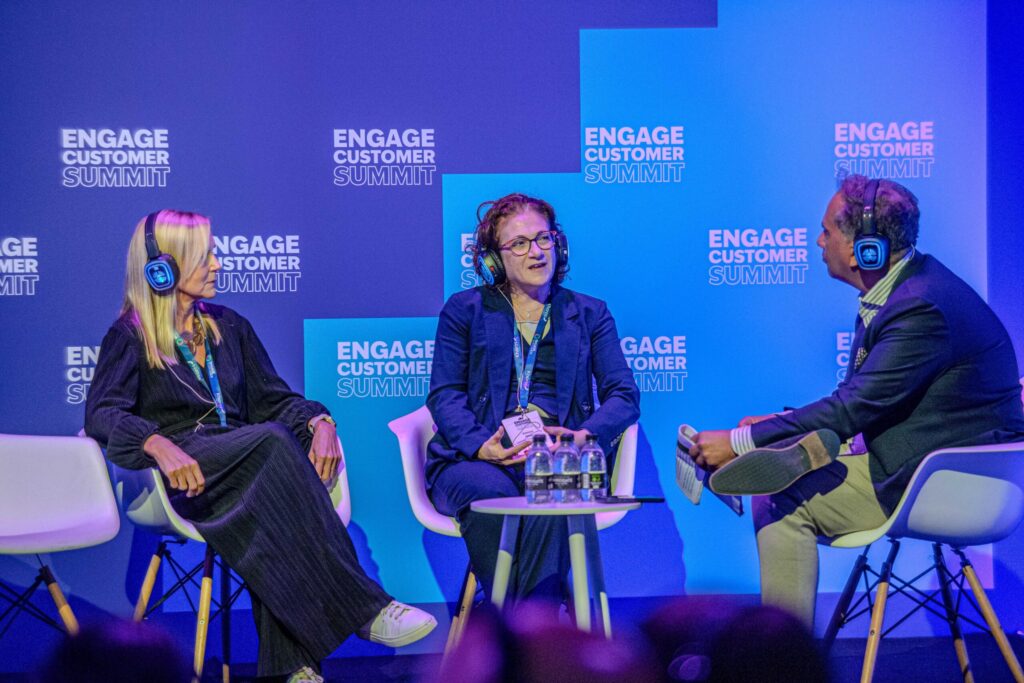 Brian Manusama moderating a panel discussion