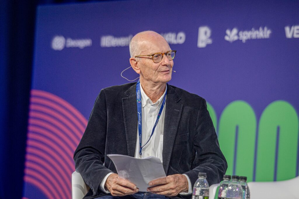 Martin Hill-Wilson chairing a session on the main stage