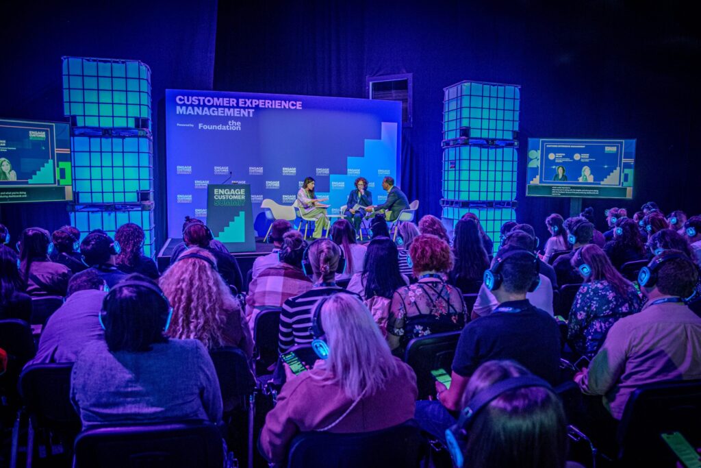 A full room following a panel on the Customer Experience Management stage