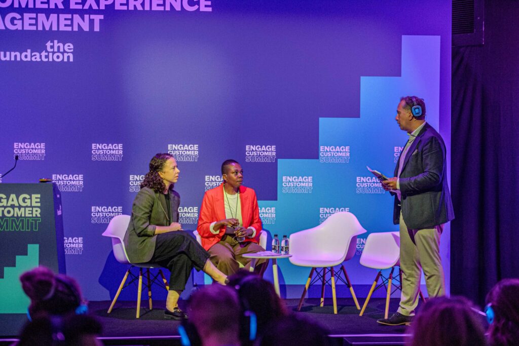 Brian Manusama chairing a panel on the Customer Experience Management stage